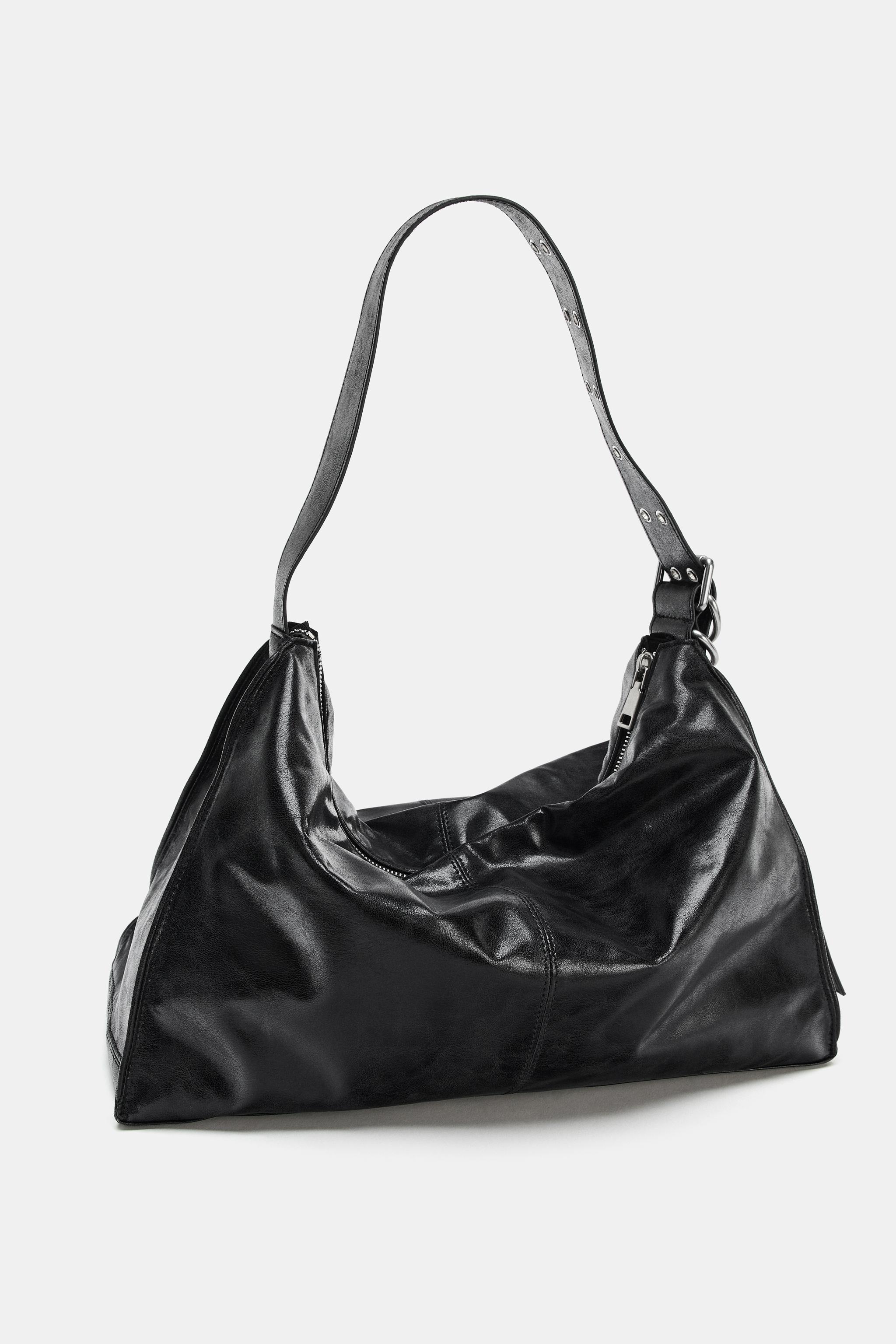 MAXI BUCKET BAG WITH METAL EYELETS